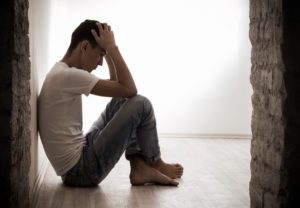 gay man seated depressed sexual assault incest article