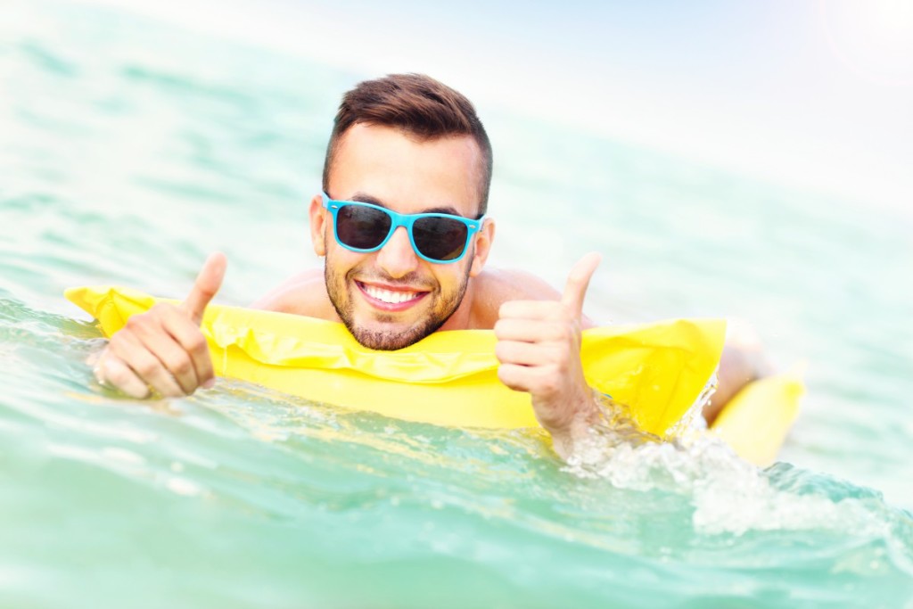 kh pp man in pool summer dollar photo