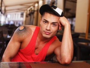 kh pp man with tattoo and red tank top Latino dollar photo