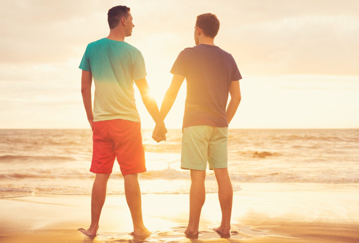 kh pp gay male couple on beach at sunset adobe photo