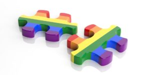 rainbow puzzle pieces deposit photo June 2021