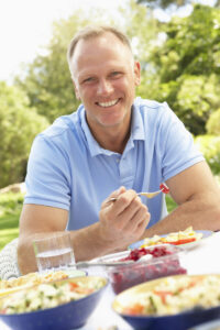 middle age man eating outdoors 12 29 21