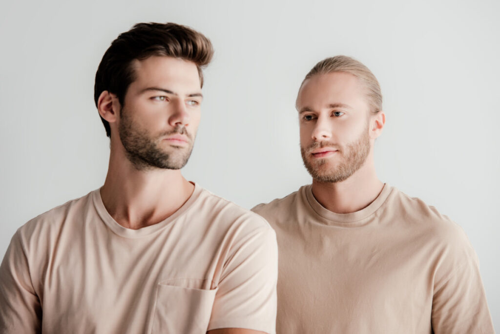 two men in beige t shirts lower volume file Feb 2022