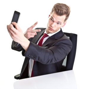 arrogant young man in suit taking a selfie deposit photo 8 7 22