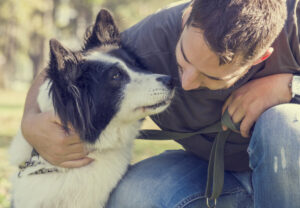 man with dog black and white dog deposit photo 9 28 22