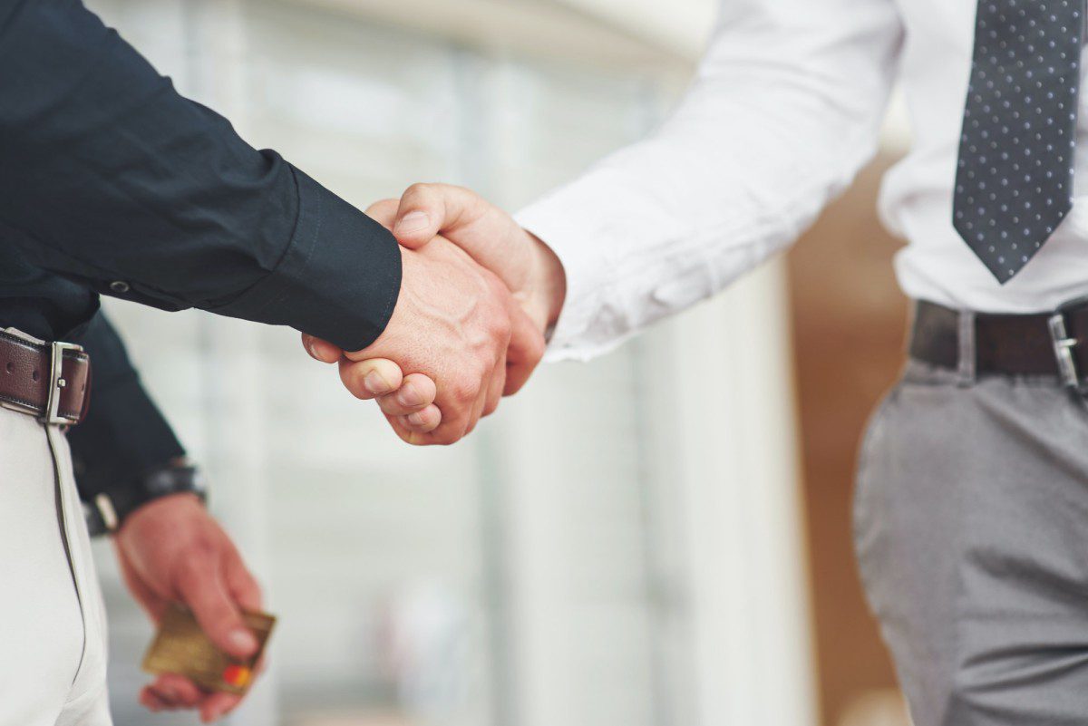 handshake of two men successful business contacts after a good deal