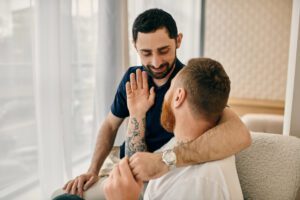 Two male partners practicing clear, direct communication.