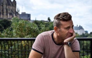 gay man reflecting during midlife transition