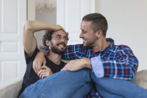 gay male couple on couch