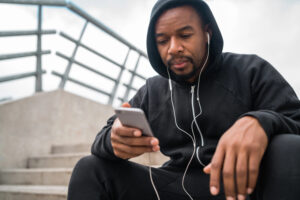 Gay man thinking about whether to follow up after a promising social interaction