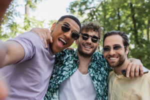Adult gay men building a real friendship in a relaxed outdoor setting
