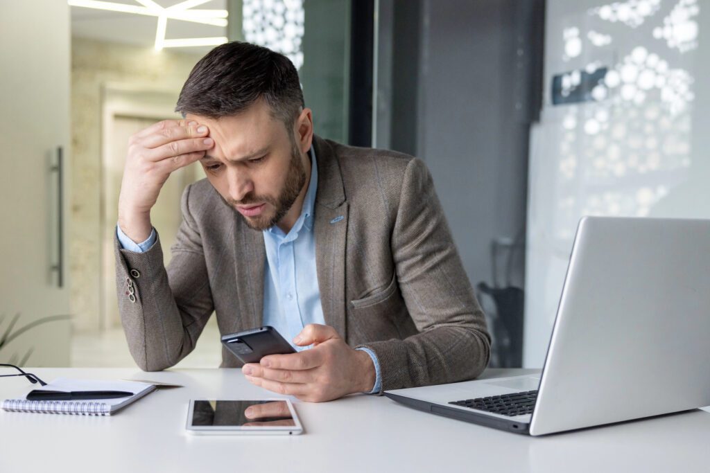 gay professional experiencing workplace anxiety